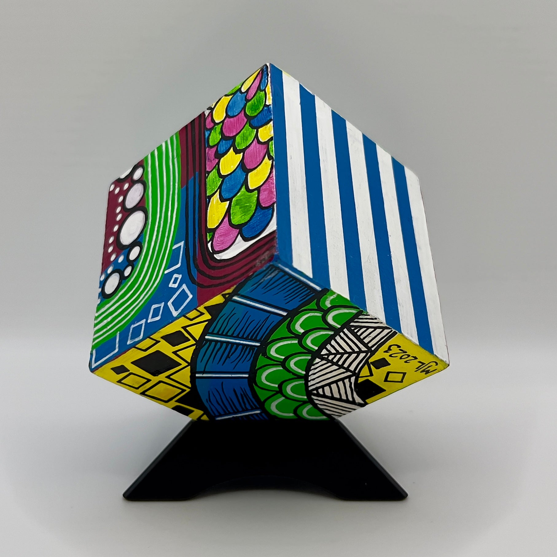 Design Using Cube Cube Art Design A Cube Adorned With Vibrant Colors And A Prominent