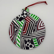 Hand-painted 4.25-inch ornament by Mary-Jo Lough featuring bold colors and intricate patterns, adding a unique touch to holiday decor.