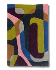 Colorful abstract patterned rug on a white background