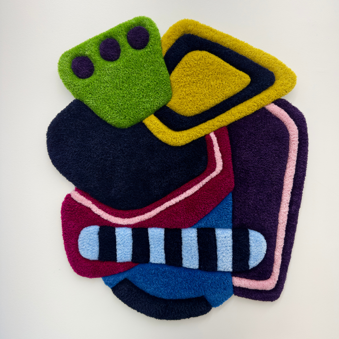 Multi coloured abstract fiber wall hanging piece created by Calgarian artists Mary-Jo Lough.